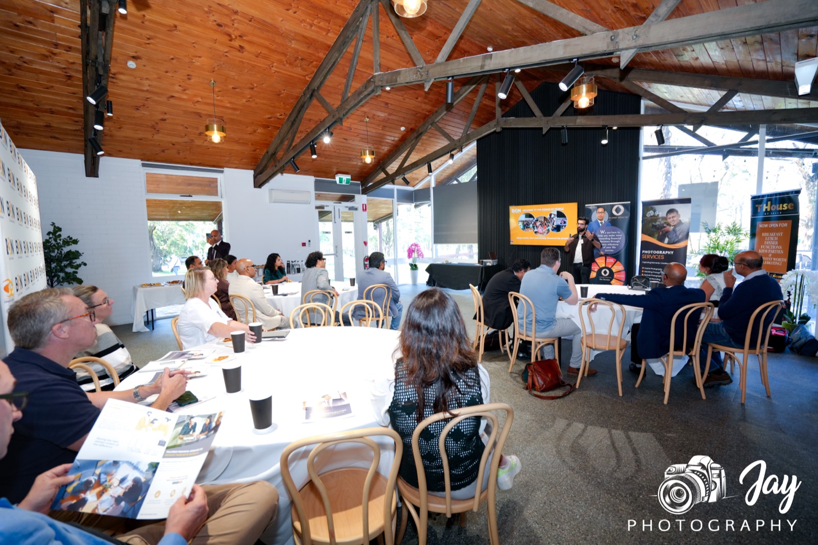 Wide view of the full room at a BGN Jells Park lunch, members seated under the vaulted timber ceiling