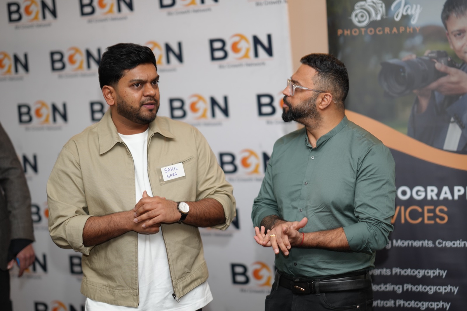 Two BGN members in a warm, engaged conversation